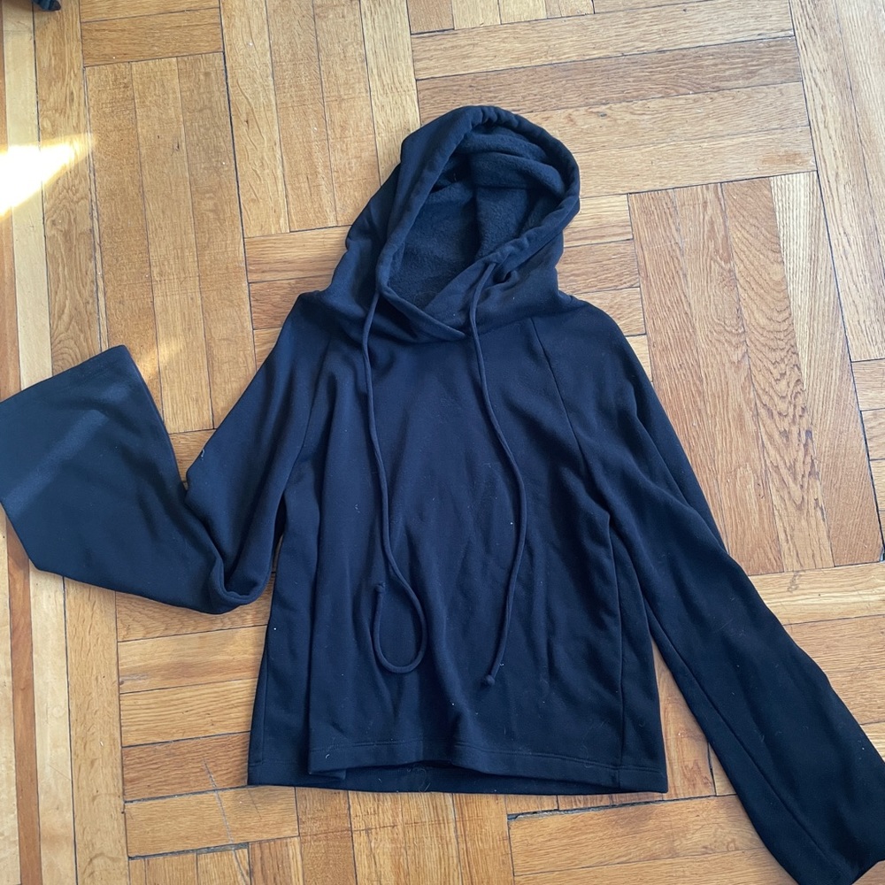 Black hoodie with flared sleeves